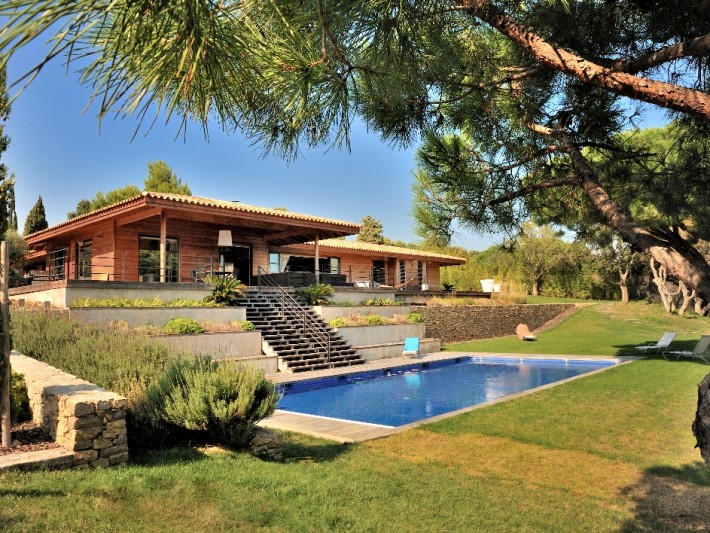 Maison bois et piscine, le bon mariage