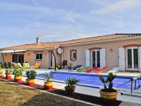 Maison de plain pied avec sa piscine